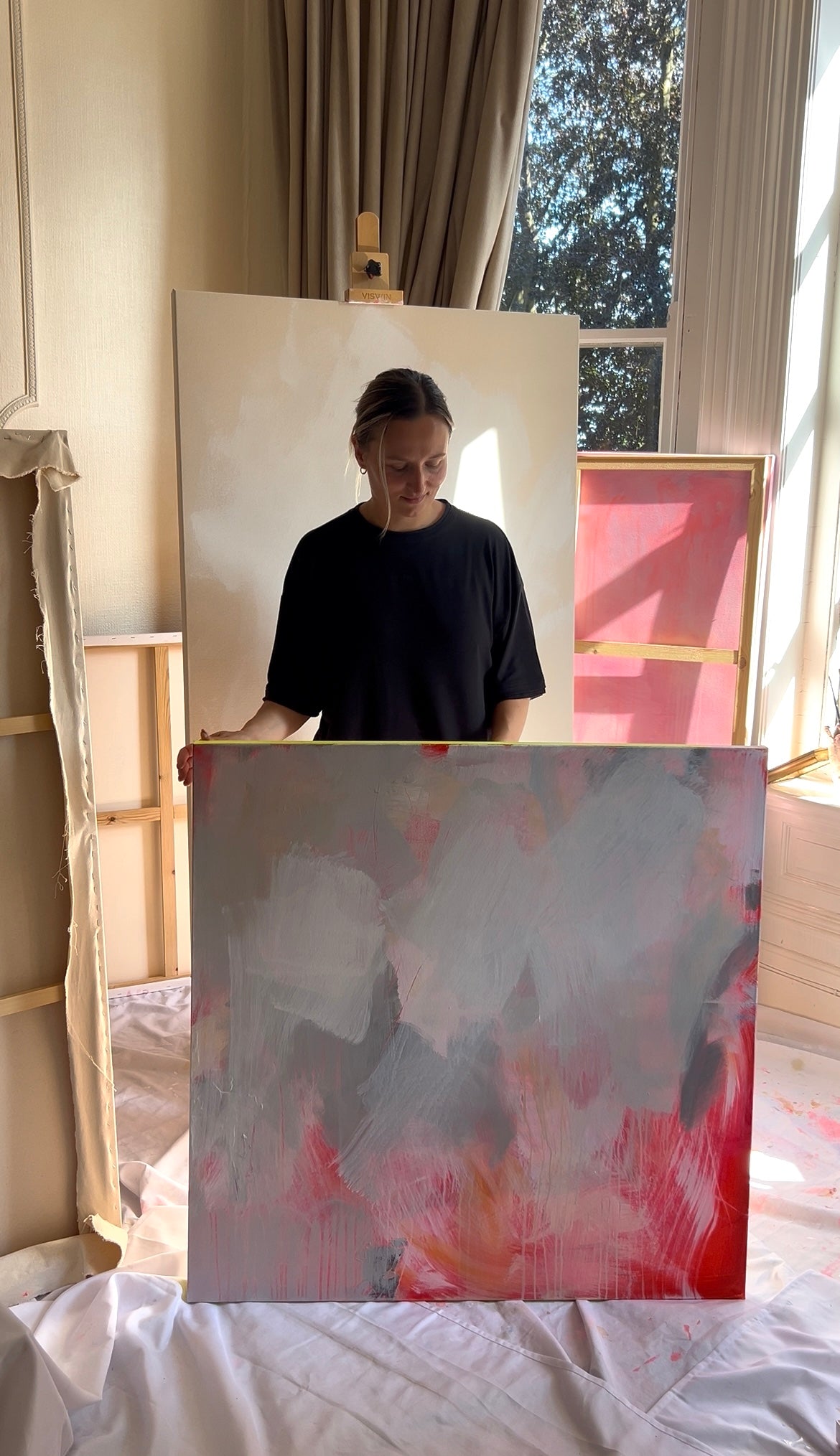 Alina Ludviga painting in her Nottingham studio
